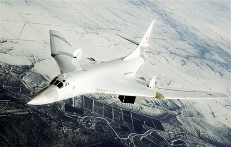 HD Military Wallpaper: Sleek Tupolev Tu-160 Bomber in Flight