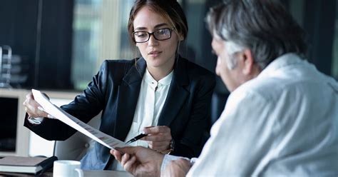 https://www.nar.realtor/_next/image?dpl=dpl_Hbajy4zWMoPnCC98TMKFqqULy48Y&q=75&url=https%3A%2F%2Fcms.nar.realtor%2F%2Fsites%2Fdefault%2Ffiles%2Fyoung-woman-wearing-a-suit-reviewing-contract-with-client-gettyimages-1160135293-1200w-628h.jpg%3Fitok%3D-vlWD1ym&w=3840&utm_source=chatgpt.com