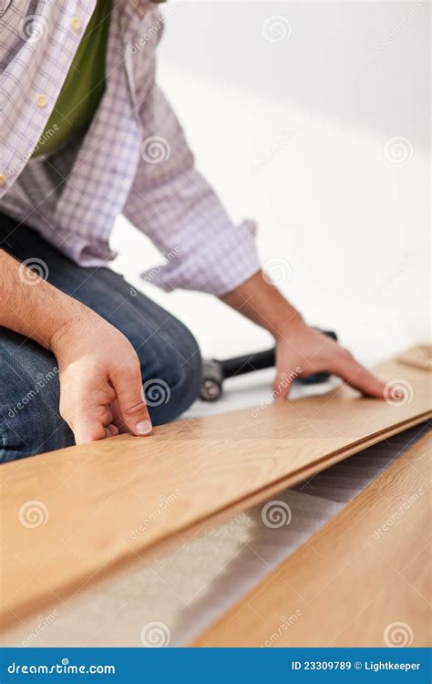 Laying Laminate Flooring - Closeup Stock Image - Image of employee ...