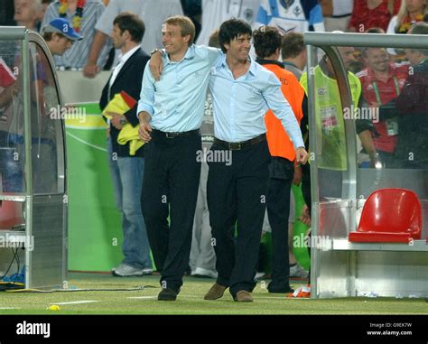 Germany's coach Jurgen Klinsmann celebrates at the final whistle with ...