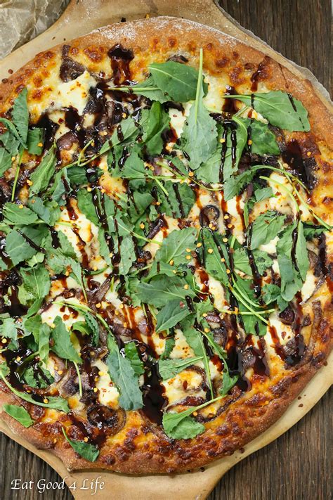caramelized onion kale goat cheese pizza with balsamic drizzle