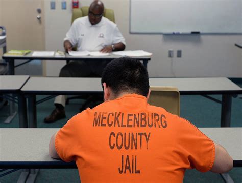 Cut inmate population at Meck jail in Charlotte, report says ...