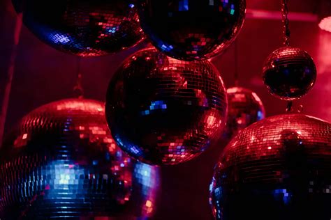 Download Disco Ball Glow Party Scene Wallpaper | Wallpapers.com