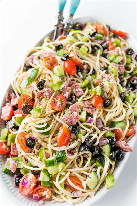 A Summer Italian Spaghetti Salad recipe with Italian dressing, and ...