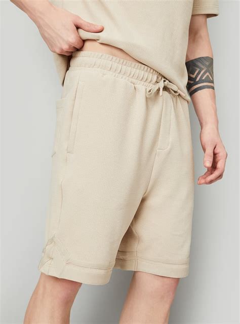 Buy Men Textured Regular Fit Sports Shorts Online at just Rs. 799.0 ...