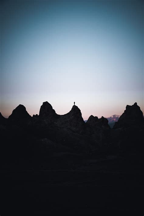 Download wallpaper 3712x5568 man, silhouette, rocks, outlines, dusk ...