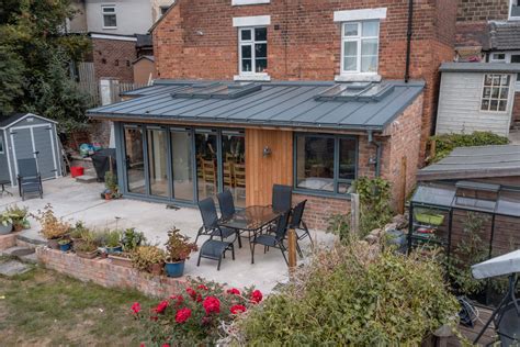 Rear extension in Conservation Area with timber cladding and zinc roof | GRT Architecture