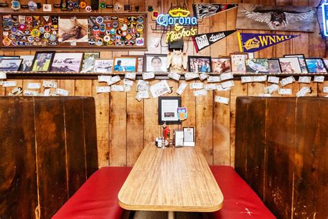 Why Are Dollar Bills Pinned to Bar Walls? The Tradition Explained ...