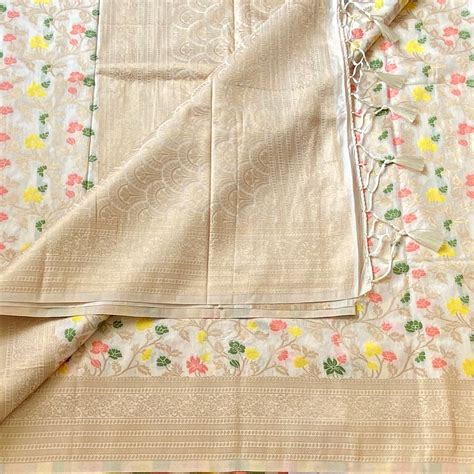 Champagne Gold Brocade Floral Saree With Woven Border Tassels – NAVARASAM