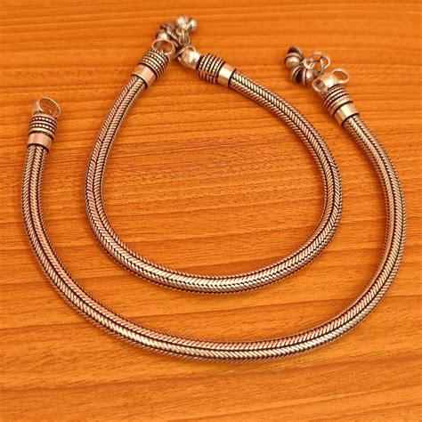 SILVER LOOK ALIKE BROAD ANTIQUE ANKLETS – Sanvi Jewels