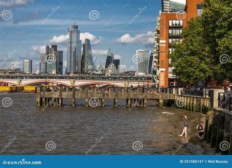 London City Skyline,and Paddling in the River Thames ,on a Warm Summer ...