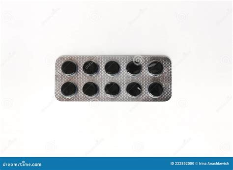 Medical Pills in a Pack, Isolated on White. Activated Charcoal, Pills for Cleansing the Stomach ...