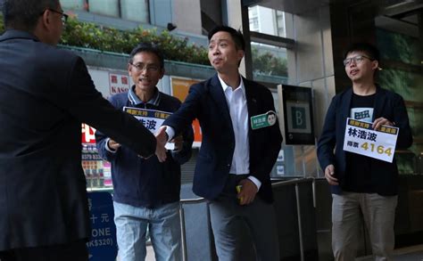 Hong Kong democrats celebrate landslide win in local elections after ...