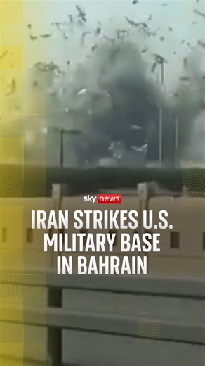 Footage shows the moment a missile explodes near a US Navy base in Bahrain. Bahraini state news says a missile attack has targeted the US Navy’s 5th Fleet headquarters in the country. Explosions have also been reported across the Gulf, as Iran retaliates against the US and Israel's attack. #skynews #bahrain #us #iran | Sky News
