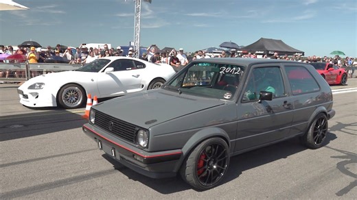 Volkswagen Golf Mk2 vs Toyota Supra at drag event