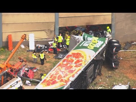2 dead after Papa Johns semi truck crashes, overturns on I-75