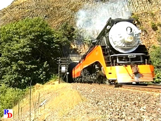 Southern Pacific 4449 utilizes BNSF tracks ast it heads east along the Columbia River Gorge in 1997. From the Machines of Iron show "4449 Journey” & “4449 Nightlight" https://rfd.video/4449Journey | Steam Giants