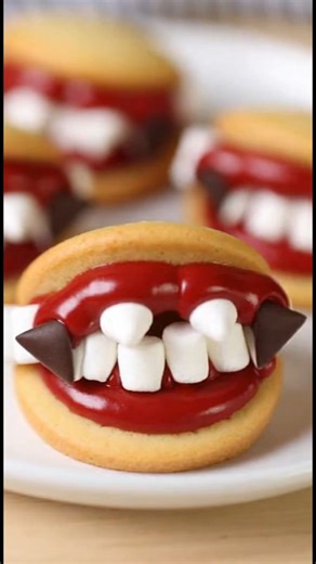 Vampire Teeth Cookies 🧛‍♂️🍪✨ Spooky, sweet, and fun—soft cookies filled with marshmallows to look like creepy-cute vampire teeth. Perfect for Halloween treats! 😋🎃 #VampireTeethCookies #HalloweenBaking #SpookySweets #FunDessertsUSA #HolidayTreats #FoodTokFavorites #CreativeBakes | Tracy Cooking