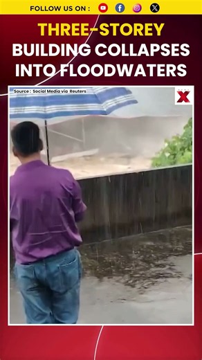 #watch Three-Storey Building Swept Away By China Floods