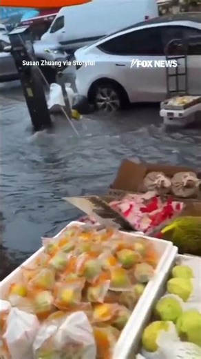 WATCH: Floodwaters rush streets in NY as heavy rain triggers flash flood warnings #shorts #usa #nyc