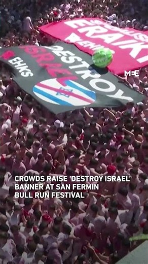 Crowd raise ‘Destroy Israel’ banner at San Fermin bull run festival in Pamplona
