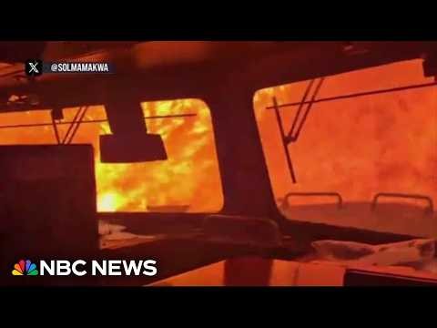 Terrifying video of train trapped in wildfire