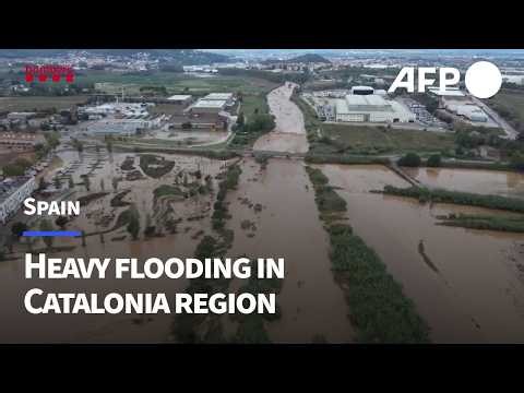 Heavy flooding submerges entire roads in Spain, drone shots reveal | AFP