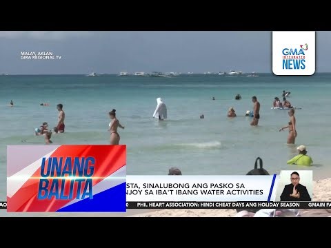 Libo-libong turista, sinalubong ang Pasko sa Boracay; nag-enjoy sa iba't ibang... | Unang Balita