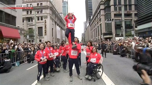 Japanese athletes of Milano Cortina Olympics, Paralympics stage parade of thanks