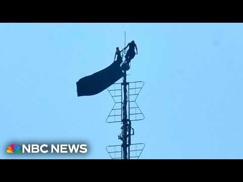 Full Special Report: Two trespassers climb the Empire State Building spire