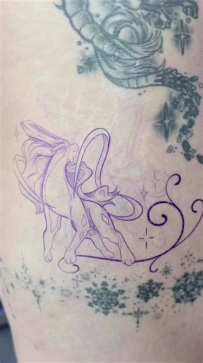 yesterday I had the absolute honor to add Suicune to my Pokédex for my Bestie!!! it's so crazy that her and I met in the second grade, and now I've tattooed her a handful of times:,) so blessed to have such awesome friends I didn't realize how difficult it would be to overlap the two pictures LOL but I kind of did it og I have to find a better way to do this lol cause I love this trend. It's so cool. . Pokémon tattoos in Dearborn, Michigan- Finer Line Tattoos #suicune #pokemontattoo #suicunetatt