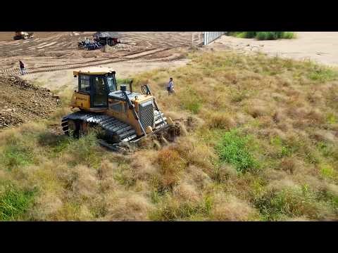 INCREDIBLE!! BULLDOZER USE THE FORCE TO PUSH THE GRASS TO MAKE A LONG ROAD FOR THE DUMP TRUCKS