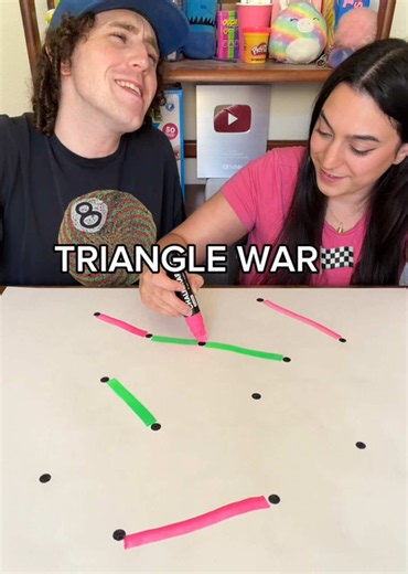 Triangle War board game: Leaf vs Purse couples challenge