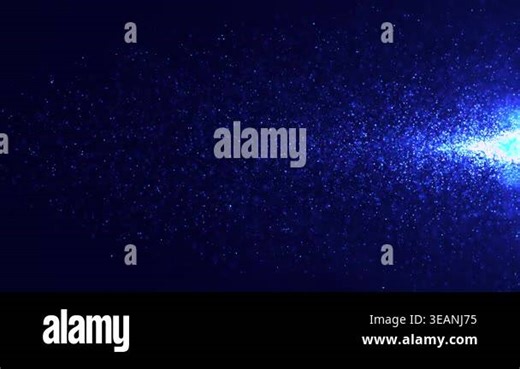 A stream of bright blue particles slowly floats through the dark space. Moving, shimmering sparks fly in all directions. Animation in 4K resolution Stock Video Footage - Alamy