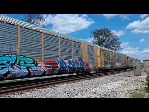 KCS 4085 leads a fast Autorack train through Downtown Coal City, IL