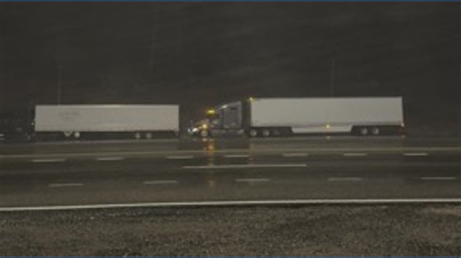 Snow falling along I-70 in mountains