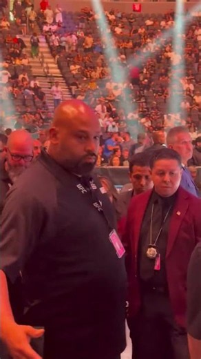 Hunter Campbell greets Robert Whittaker after UFC 329 win