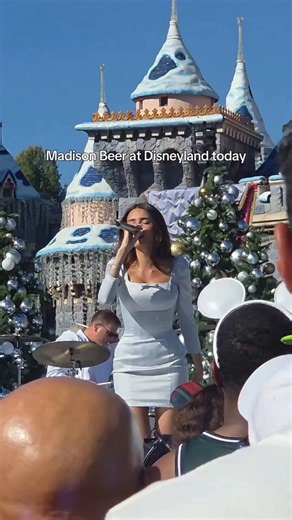 Madison Beer covers ‘Snowman’ by Sia at Disneyland today.