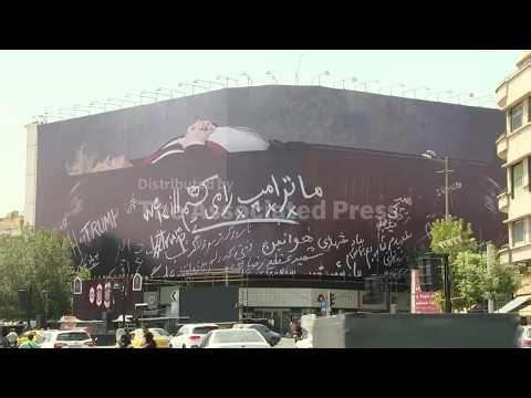 Large billboard depicting Trump lying in a coffin installed in central Tehran