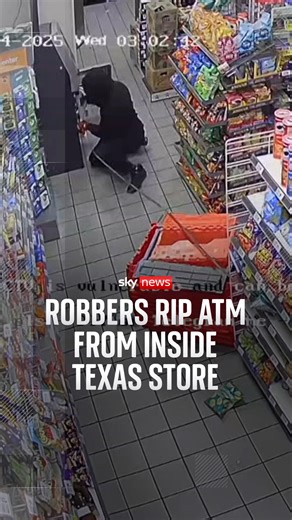 CCTV footage captured the moment two masked suspects attempted to steal an ATM from a convenience store in Texas. The White Settlement Police Department is searching for the suspects. | Sky News