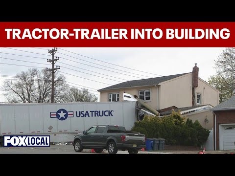 Tractor-trailer crashes into business on Route 3 in Clifton
