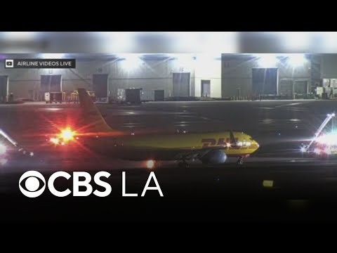 DHL cargo erupts into flames at LAX after experiencing brake issues