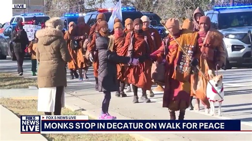 Crowds gather in Decatur for Buddhist monks' walk for peace