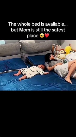 The whole bed is available, but Mom is still the safest place 🥹❤️