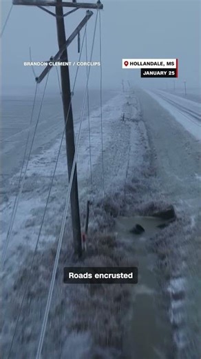 Ice snaps trees and power poles