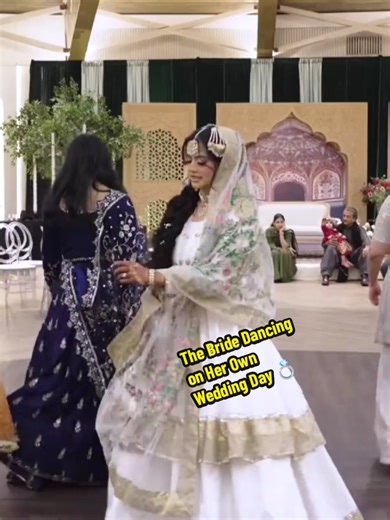 Bride's Joyful Dance on Her Wedding Day