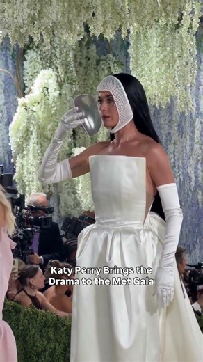 #KatyPerry brings the drama to the #MetGala.