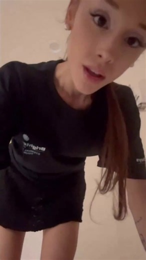 Ariana Grande singing ‘hate that i made you love me’ in a shower room.