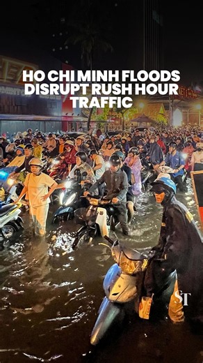 Floodwaters inundate streets in Ho Chi Minh City during rush hour after heavy rain
