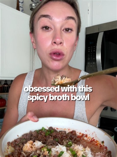 Spicy Sichuan Beef Brothy Rice Bowl 🍚🌶️ #recipe #cooking #easyrecipes #ricebowl ½ cup uncooked jasmine rice 5 oz lean ground beef 1½ cups bone broth 2 tsp Sichuan chili paste (more if you like spicy spicy) 2 cloves garlic, minced Salt & pepper, to taste 1 green onion, sliced, for topping Rinse and cook jasmine rice according to package instructions. In a pan over medium-high heat, brown ground beef for 4–5 minutes, breaking it apart as it cooks. Season with salt and pepper. Add minced garlic. 